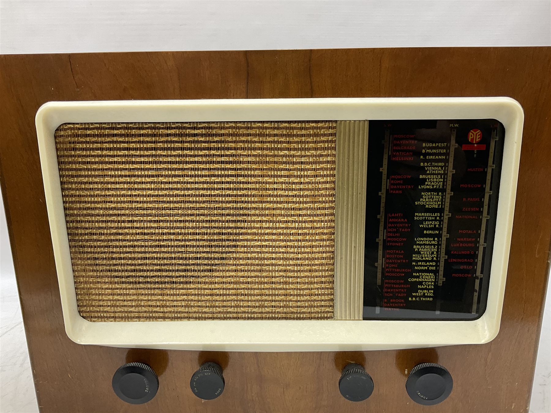 1950s Pye Type PE80 Cambridge International radio, W58cm H43cm D27cm, together with 1952 Pye Type P45 valve radio and 1940s Pye Type 15A radio (3)