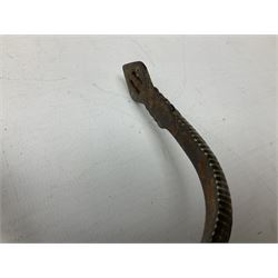 Pair of late 19th century South American iron spurs, engraved silver mounts, with sunburst rowls