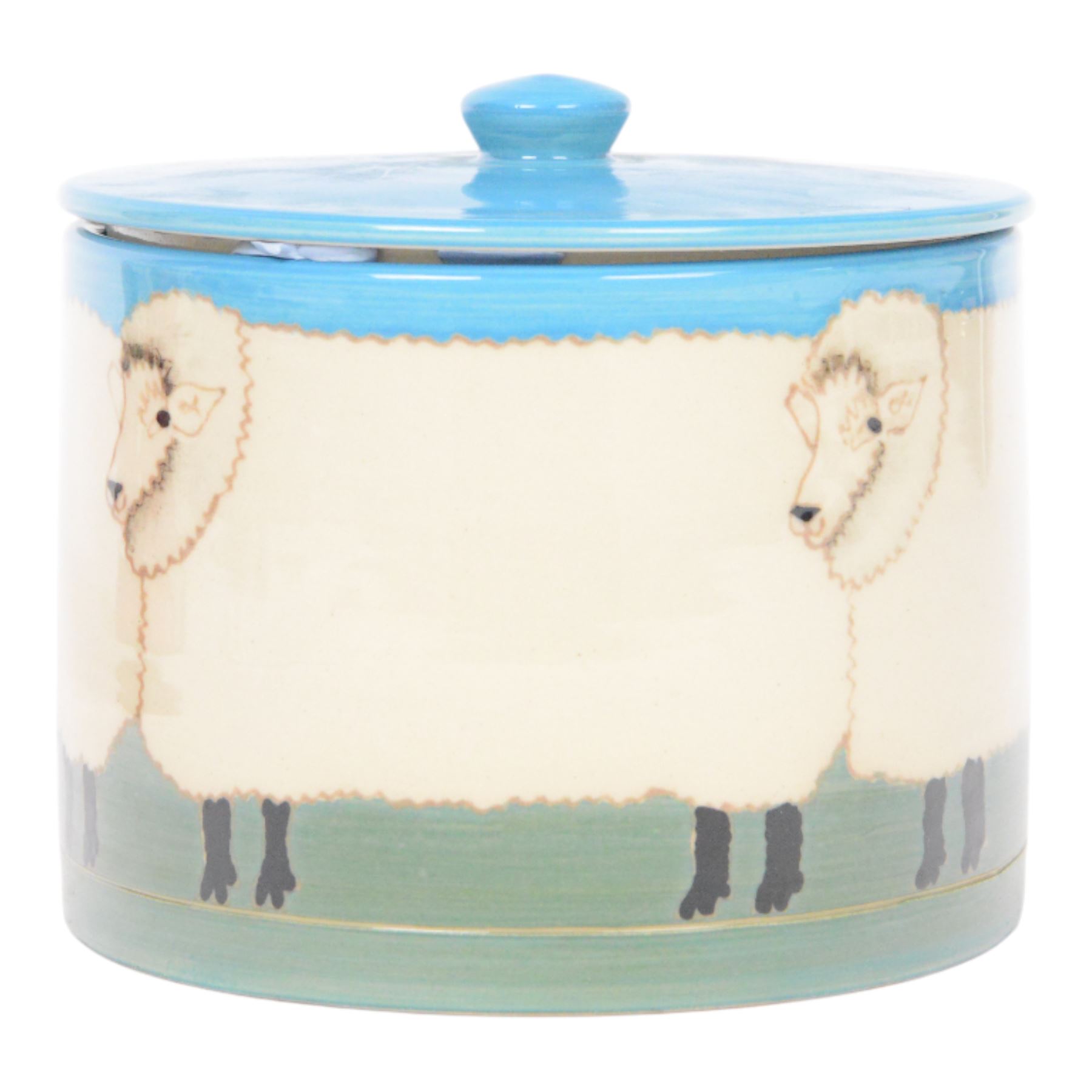 Dennis Chinaworks jar and cover, the body decorated with sheep, with a blue lid, impressed and painted marks beneath, H10cm