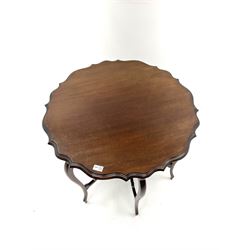 Edwardian Mahogany two-tier occasional table, moulded pie crust top, six cabriole supports 
