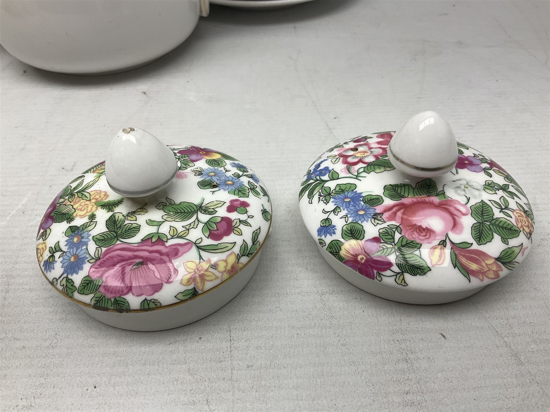 Crown Staffordshire Thousand Flowers pattern part tea service, to include teapot, two open sucriers, eighteen cups, fifteen saucers etc (57)