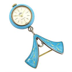 Nadine Swiss silver and enamel fob watch, silvered circular dial with baton markers, cased in blue guilloche enamel with gilt decoration, suspended from a matching brooch