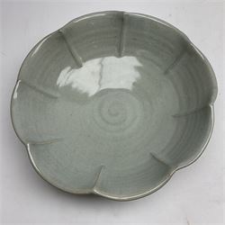 Jeremy Leach (British 1941-): Celadon glazed stoneware bowl of fluted circular form, with impressed mark beneath, D35cm