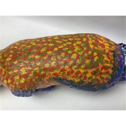 Helen Skelton (British 1933 – 2023): Two carved wooden abstract sculptures, one modelled as a dog, the other modelled as a bear, both with painted stippled decoration, largest H20cm. Born into an RAF family in 1933 in Kent and travelled the world extensively during her childhood. After settling in Bridlington, Helen immersed herself in painting, textiles, and wood sculpture, often inspired by nature's beauty. Her talent was showcased in a one-woman show at Sewerby Hall and recognised with the sculpture prize at Ferens Art Gallery in 2000. Sadly, Helen’s daughter passed away from cancer in 2005. This loss inspired Helen to donate her sculptures to Marie Curie upon her passing in 2023.