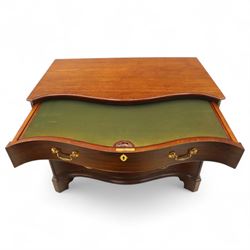 George III mahogany serpentine chest, moulded top over four cock-beaded drawers, the top drawer fitted with baize lined slide opening to reveal divisions,  enclosed by canted and fluted upright corners, the drawer fronts fitted with brass swan neck handles and circular plates with oval escutcheons, lower moulded edge over bracket feet, on lignum vitae castors