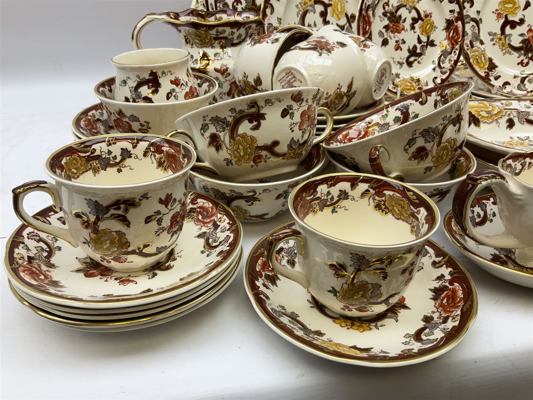 Masons Brown Velvet pattern tea and dinner wears, to include eight dinner plates, eight twin handled soup bowls and saucers, eight tea cups and saucers, cheese cover and plate, jug, meat platter etc (84)  
