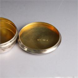 Mid 20th century silver travelling communion set, comprising goblet, paten and pyx, all hallmarked Hurst, Franklin & Co Ltd, London 1961 & 1962, with a glass bottle with unmarked cover, all within a tooled leather fitted case, goblet H9cm