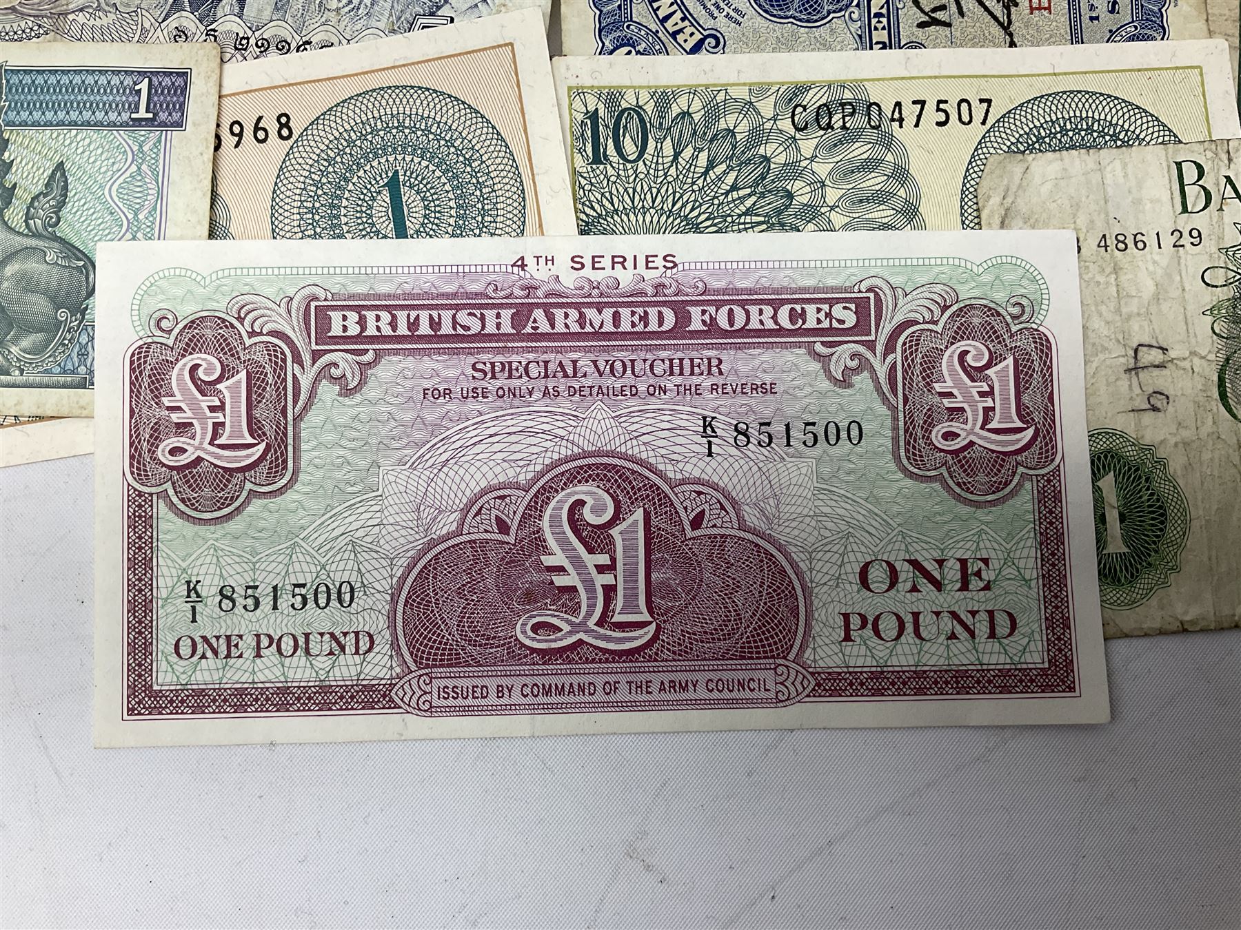 Great British and World banknotes, including Bank of England Page one pound 'EW57', Forde ten shillings 'C41N', various Belgian and Scottish notes etc