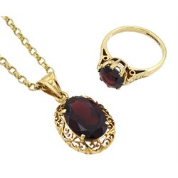 9ct gold single stone garnet ring, 15ct gold garnet pendant, on a 9ct gold chain