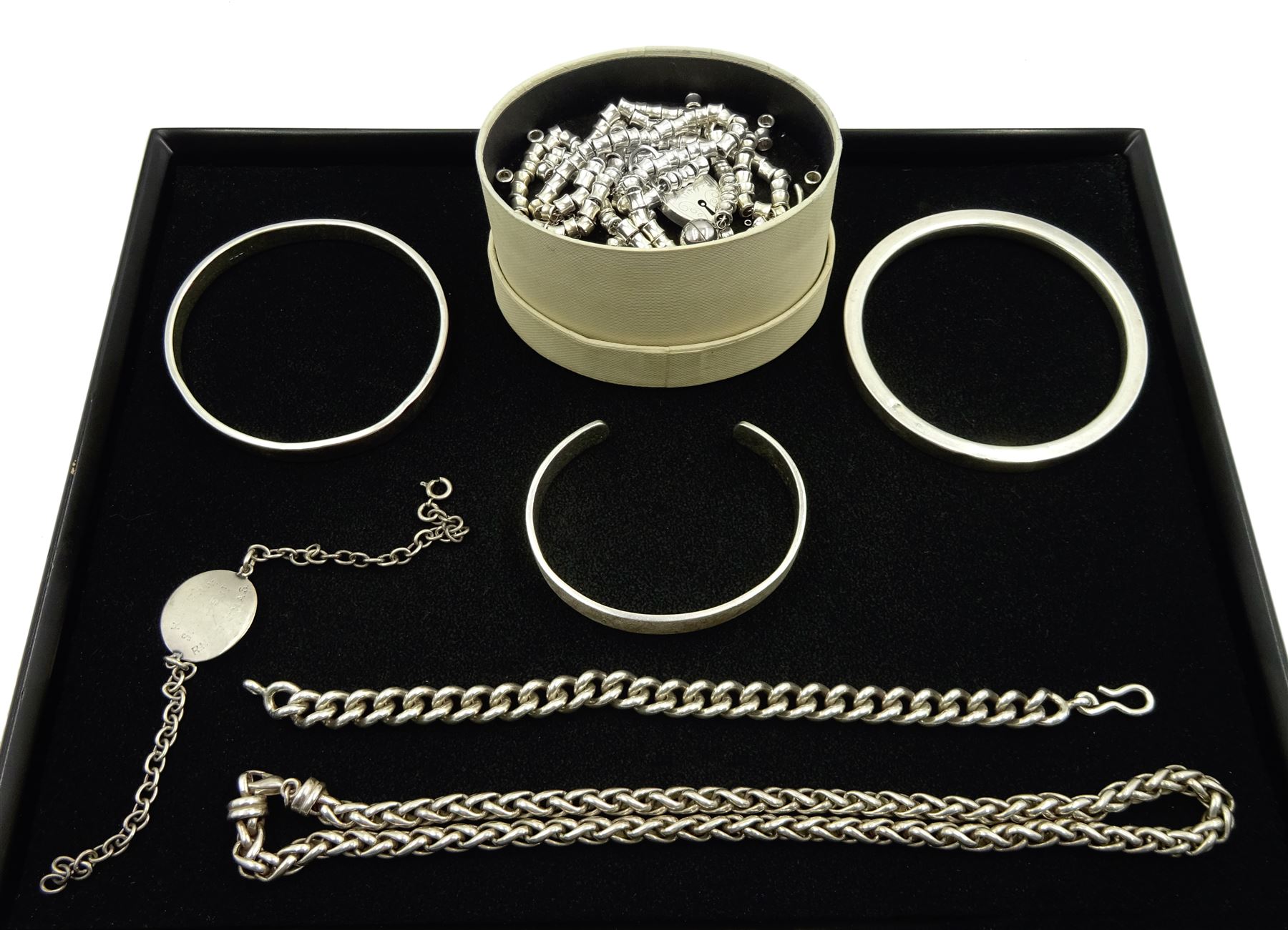 Two silver bangles by Charles Horner Ltd, Chester 1921/3, Links of London necklace converted into bracelet and shorter necklace, bracelets and necklace, all hallmarked or stamped