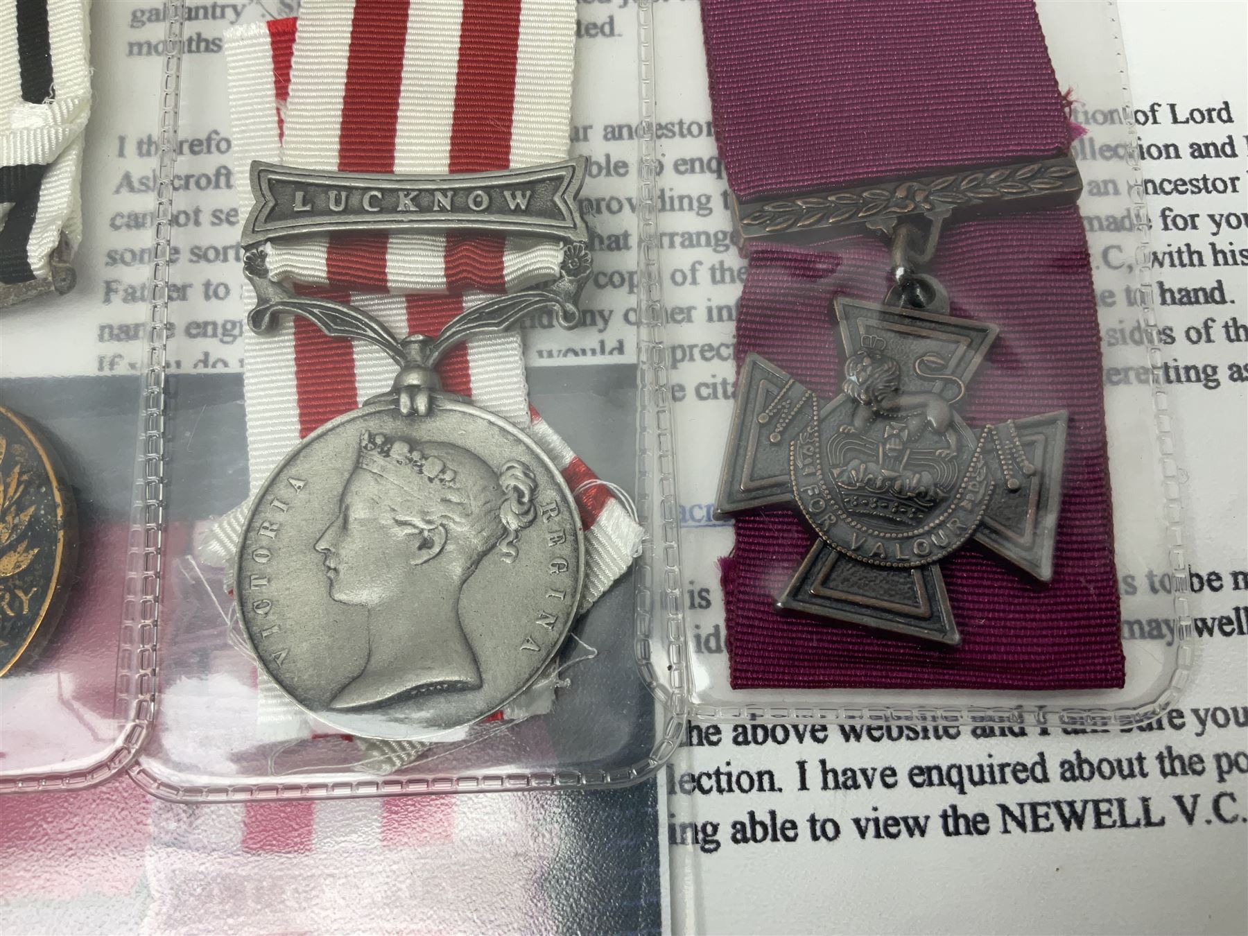 Two Imperial Service Medals to Elsie Hannah Ferguson and Fred Whitehead; each in original case; WWI Special Constabulary Medal to Inspr. Alfred W. Thompson; modern Prisoner of War Medal; cased; replica Victoria Cross and India Mutiny Medals with archive of information relating to Pte. Robert Newell V.C. 9th Lancers; replica Victoria Cross and George Cross with miniatures; and other replica medals etc