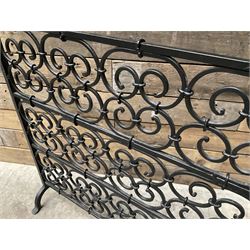 Black painted wrought iron fire guard , wicker log basket with stand, coal bucket and a fire kerb (4)