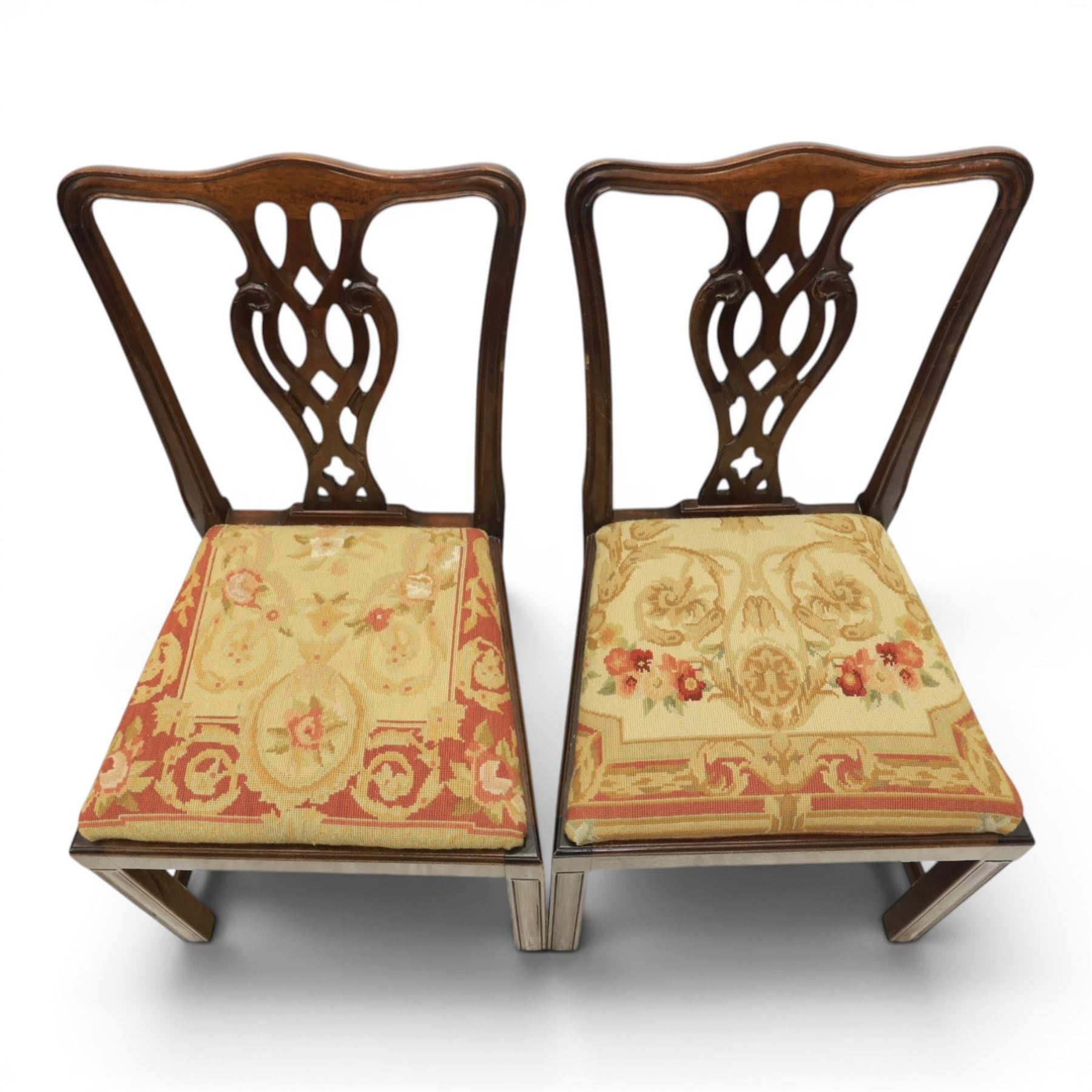 Large 19th century mahogany extending dining table with set of Chippendale design chairs, extending dining table with rectangular moulded top additional three leaves, raised on turned supports terminating in brass castors, the dining chairs (2 + 2) with shaped cresting rail and pierced splats, raised on square supports with stretchers