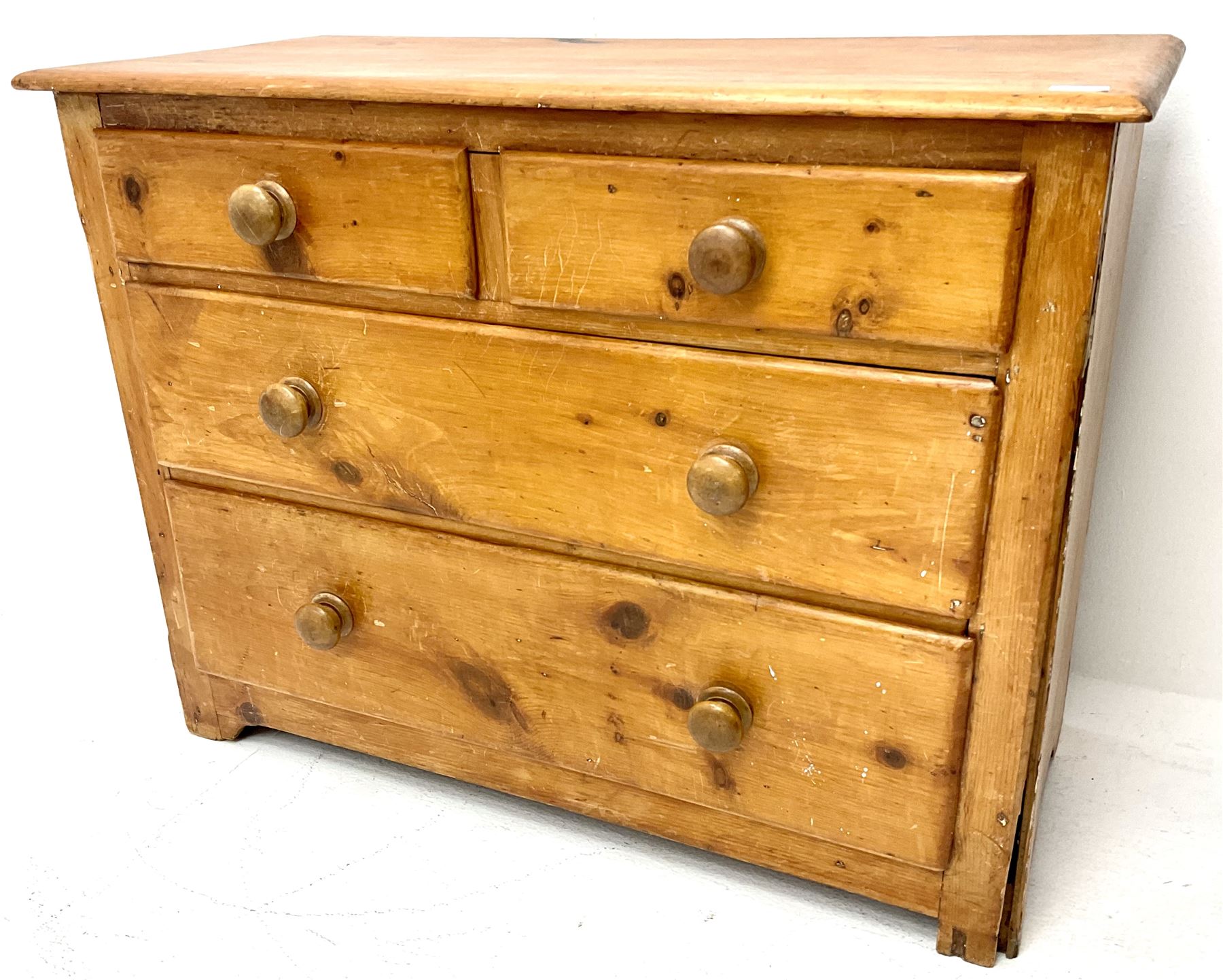 Victorian pine chest, two short and two long drawers, solid end