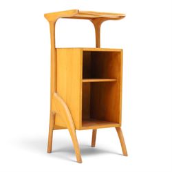 Mid-20th century teak side table with sliding top tray, raised sliding top above an open recess with two shelves, shaped frame support