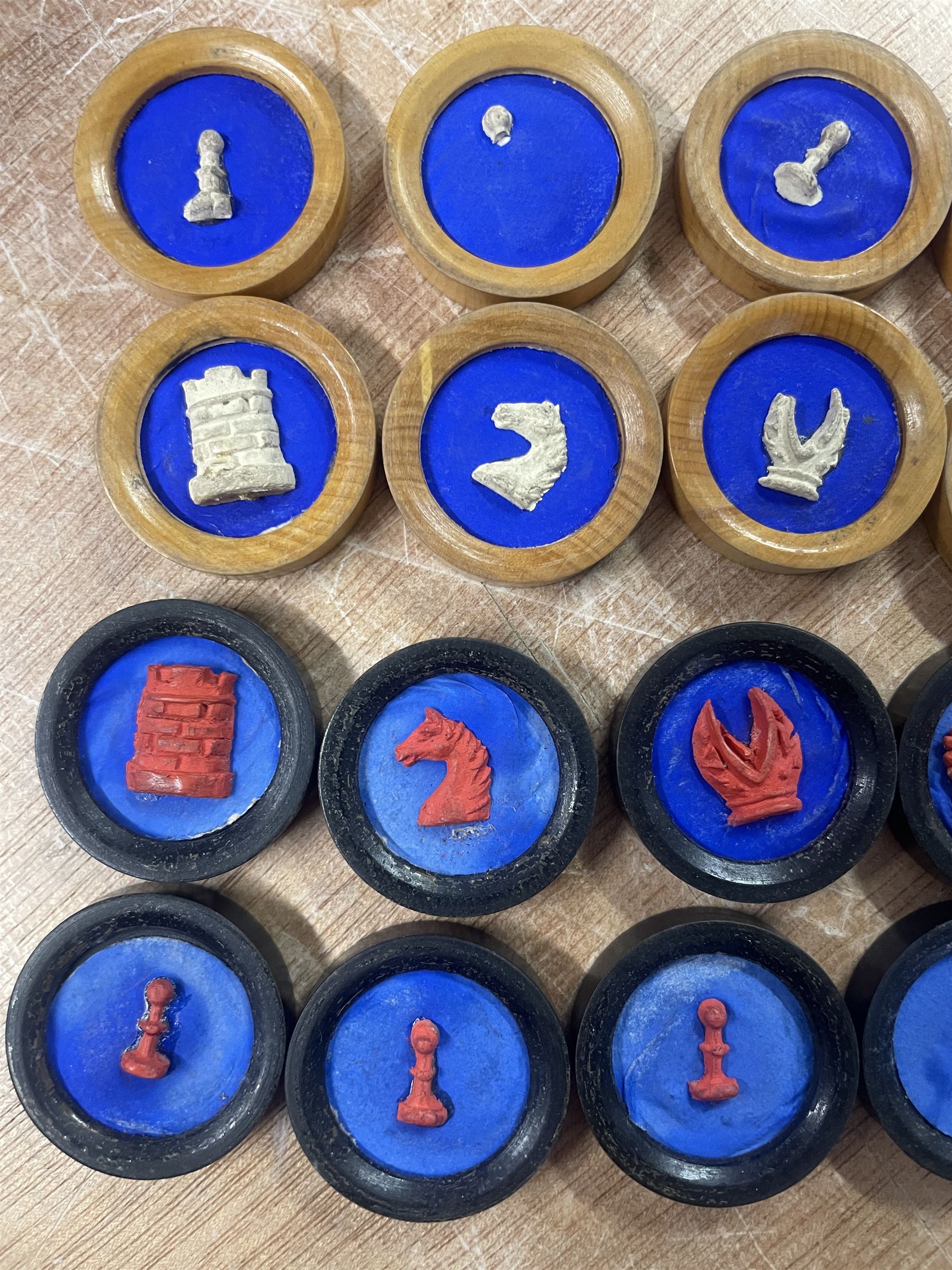 Jaques of London portable B.C.D. board for Backgammon, Chess and Draughts, the inner tube containing thirty two counters and two dice, outer red leather case