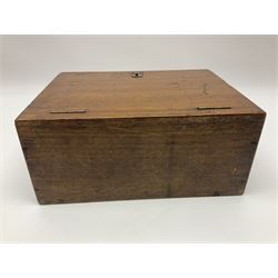 Wooden table stationery box, with drop down front and fitted interior, with metal shield plaque to the hinged lid, H18cm
