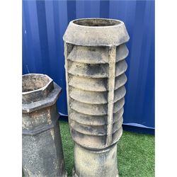 Five Victorian terracotta chimneys, four octagonal examples, one stamped for ‘James Gooddy, Barnsley’, the tallest height - 111cm - THIS LOT IS TO BE COLLECTED BY APPOINTMENT FROM DUGGLEBY STORAGE, GREAT HILL, EASTFIELD, SCARBOROUGH, YO11 3TX