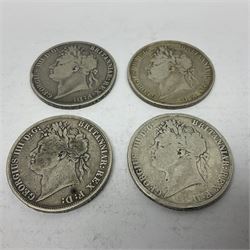 Four King George IIII silver crown coins, dated three 1821 and 1822