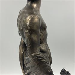 20th century silver plated figure, modelled as a classical male figure, possibly Prometheus, holding flames, one foot resting atop a small dragon, upon a circular spreading base, overall H37.5cm