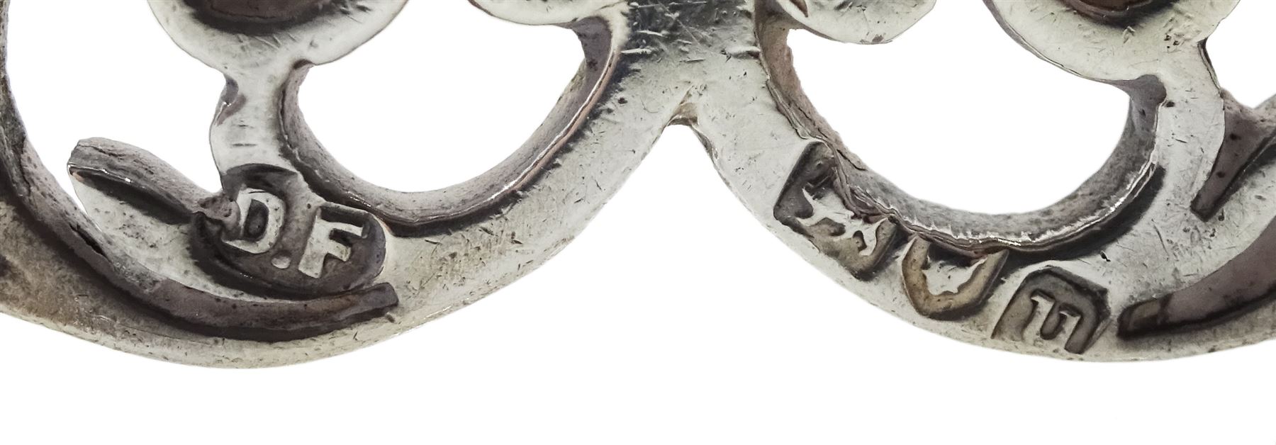 Edwardian silver sovereign holder by A & J Zimmerman Ltd,  Birmingham 1902, silver whistle by John Bettridge, Birmingham 1824, pair of silver knife rests by Josiah Williams & Co, London 1919, silver cheroot holder, Victorian 1889 silver crown, pill box and a silver Middle Eastern embossed mount