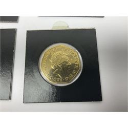 Four gold plated and coloured commemorative fifty pence coins, comprising 2017 Benjamin Bunny, Mr Jeremy Fisher, Tom Kitten and The Tale of Peter Rabbit, with Gold Strike certificate of authenticity