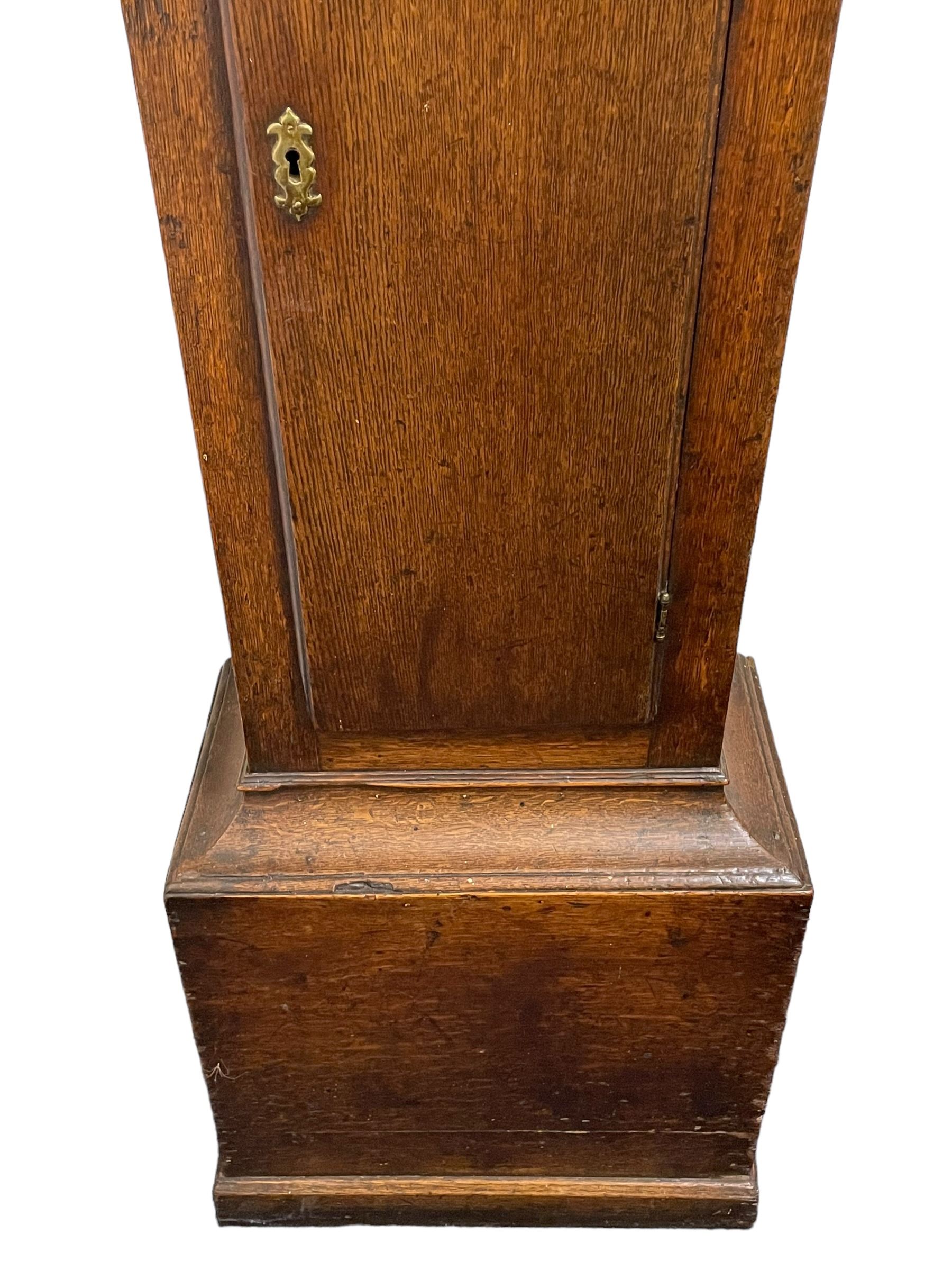 Gilbert Kidd of Malton (North Yorkshire) - late 18th century oak 8-day longcase clock c1780,  with a tall double caddy top and later brass ball and spire finials, break arch hood door beneath with attached pilasters and wooden capitals,  plain trunk with a long flat topped door, raised on a square plinth with applied skirting,  brass break arch dial with the makers name to the silvered boss in the break arch, engraved and silvered dial centre and chapter ring, with cast spandrels and matching steel hands, subsidiary seconds dial and square calendar aperture, dial pinned directly to a rack striking movement with a recoil anchor escapement, sounding the hours on a cast bell. With pendulum and weights.
The Kidd family were a prolific family of provincial clockmakers working in Malton from the mid 18th century until the early 19th century. Many of their clocks are simply signed 