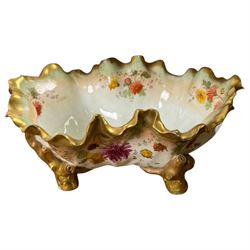 Moore Bros basket, decorated with floral sprigs and gilt detail, together with another basket and glass dish