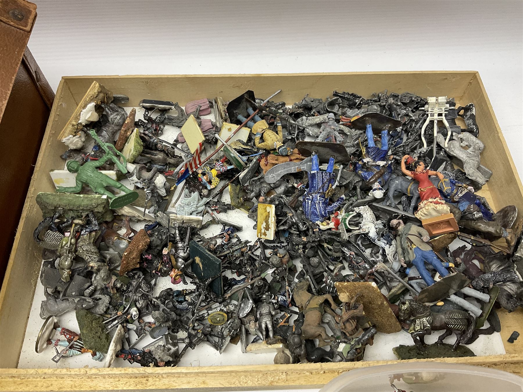 Large variety of predominantly metal miniature soldiers, a mixture of painted and non-painted figures, to include examples of American, British and European soldiers 
