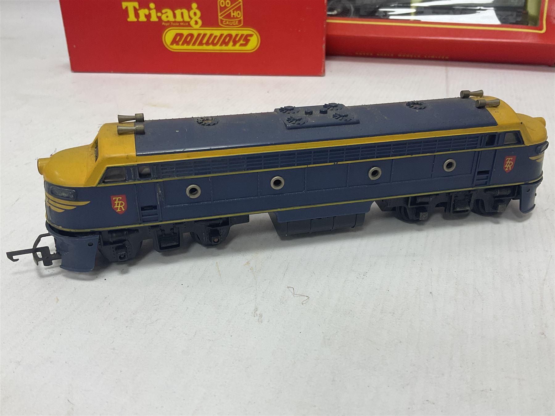 Hornby/Tri-Ang ‘00’ gauge - nine locomotives to include Britannia Class ‘Britannia’ 4-6-2 no.70000 in BR green; Class M7 4-4-0 Tank no.30027 in BR black; Princess Class ‘Princess Victoria’ 4-6-2 no.46205 in BR black; in original boxes; further loose models Princess Class ‘Princess Elizabeth’ 4-6-2 no.46201 in BR green; Class 3F 0-6-0 tank no.7606 in LMS crimson; TR double ended diesel locomotive; three further tank locomotives and one loose tender (10) 