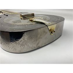 Ozark metal cased resonator guitar with all over chased foliate decoration to the polished finish and mother-of-pearl inlay to the fretboard L100cm; in Stagg hard carrying case