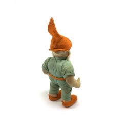Chad Valley pressed felt figure of the Disney Snow White dwarf 'Doc' with painted facial features, standing wearing a green linen suit with orange hat, belt, buttons and shoes H13
