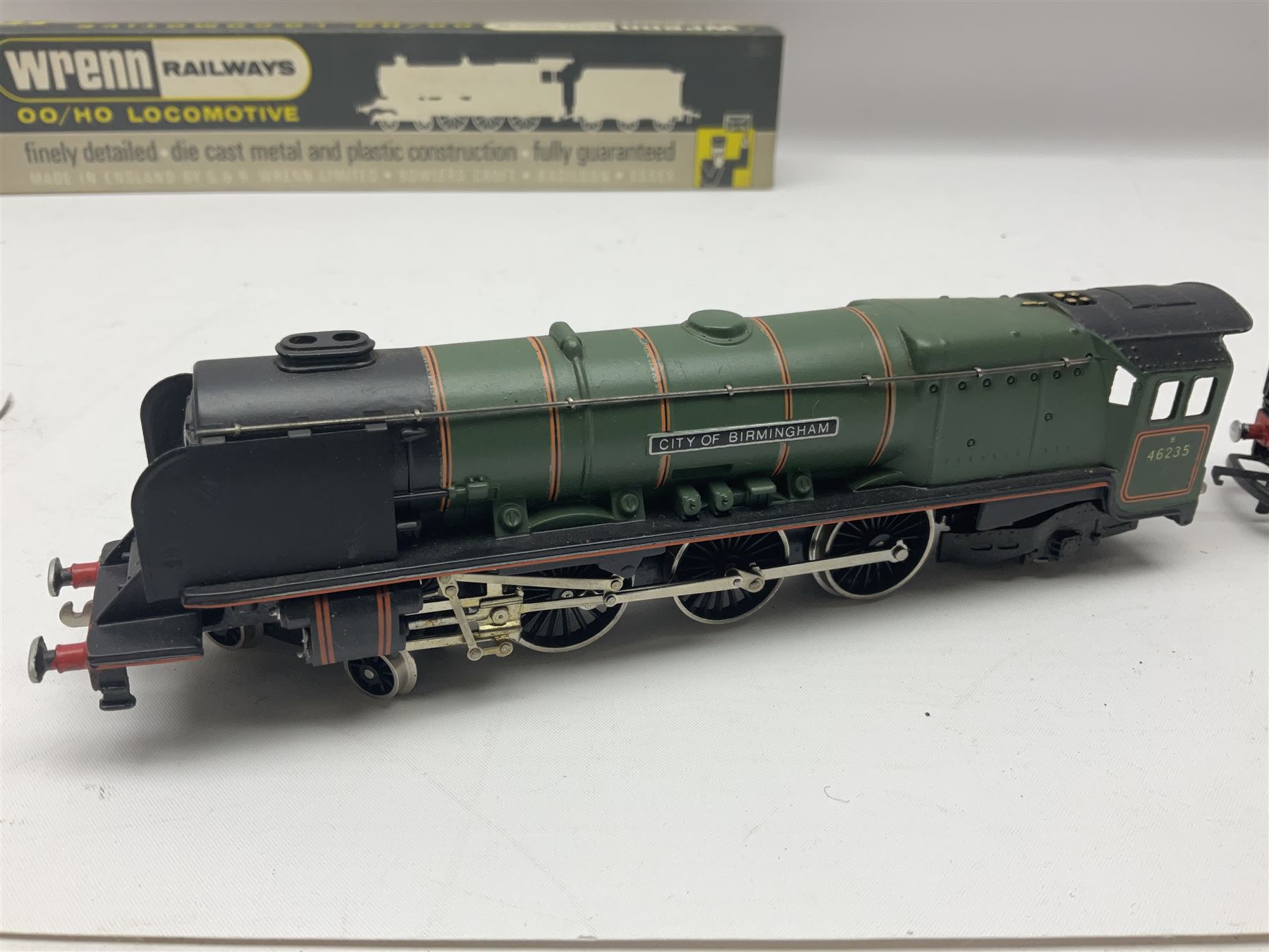 Wrenn '00' gauge - two Princess Coronation (Duchess Class) 4-6-2 locomotives - 'City of Birmingham' No.46235 in BR Green; boxed with tender and instructions; and 'City of Stoke-on-Trent' No.6254 in LMS lined black with associated plain blue box (2)