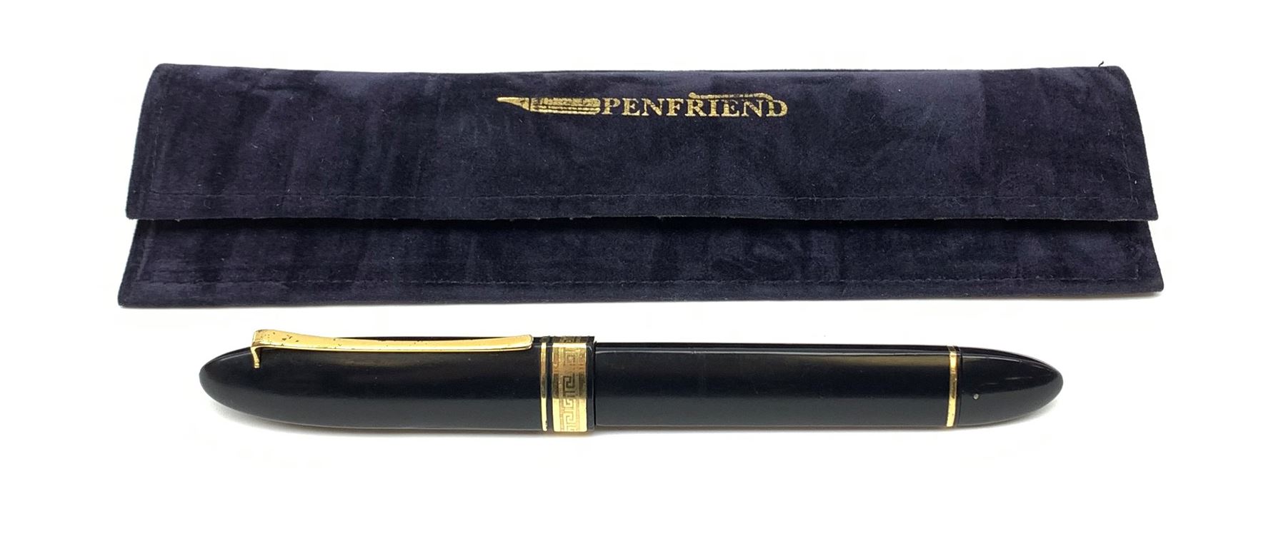 An Omas 360 fountain pen, the black triangular section body with gold coloured clip and banding, and Greek Key border to the cap, the bicolour nib marked 750 18K.
