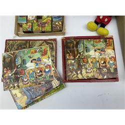 Two boxed Snow White and the Seven Dwarves cube jigsaws, another boxed cube jigsaw, Mickey Mouse stuffed toy, concertina and other toys etc