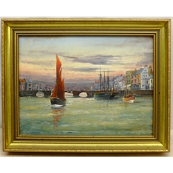 Robert Sheader (British 20th century): Sunset in Whitby Harbour, oil on board signed 29cm x 39cm