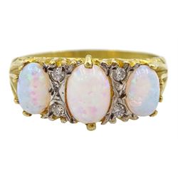 Silver-gilt three stone opal and cubic zirconia ring, stamped Sil 