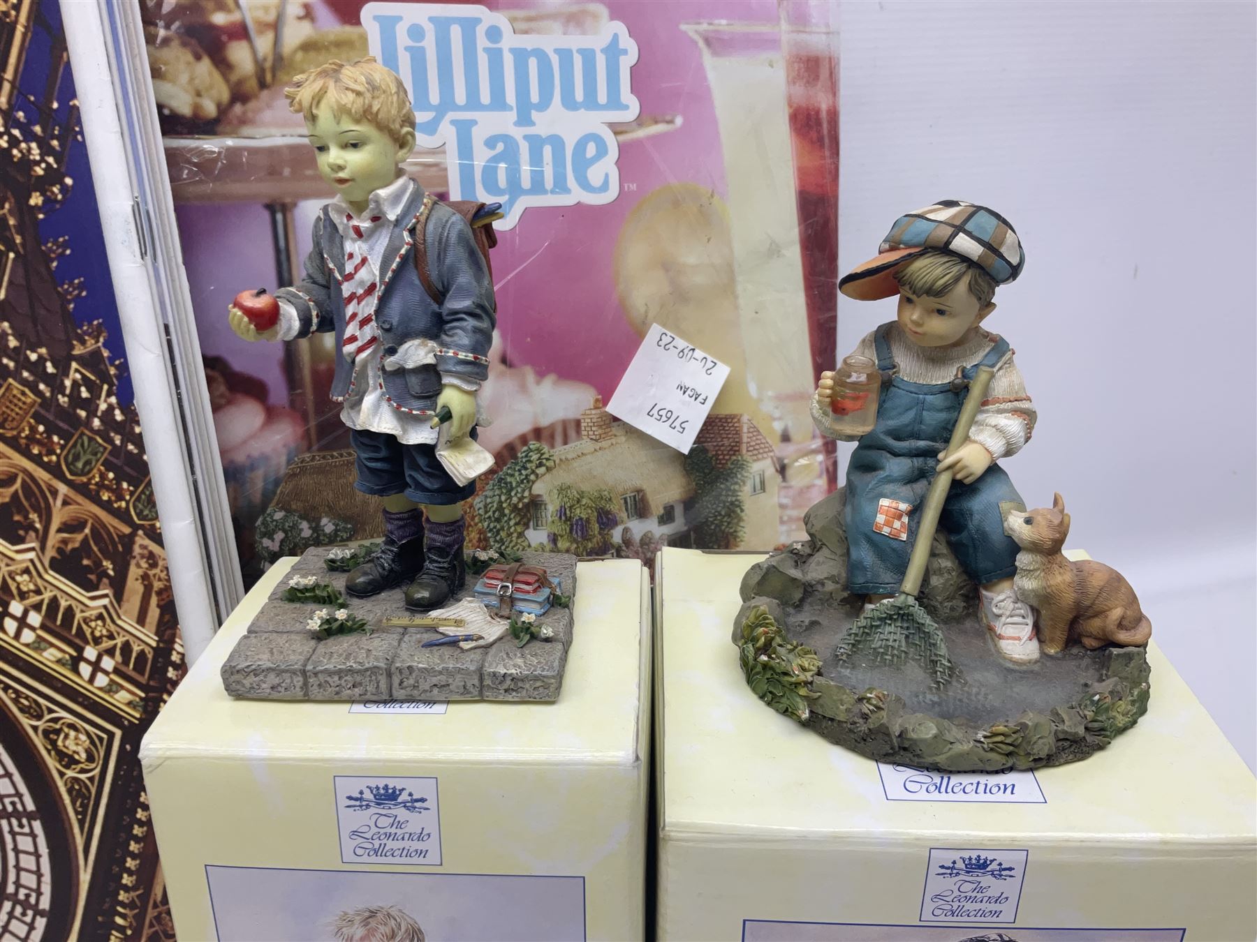 Twenty three Lilliput Lanes, including Village School, Lace's Shoe Shop, Cockles & Muscles, Scotland the Brave etc, together with The Leonardo Collection Paint Box Poppets and Gullivers World magazines 