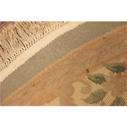  Oval jade ground Chinese washed woollen rug, with original receipt, 275cm x 185cm  