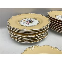 Victorian part dessert service, including eighteen plates, four small serving dishes, shallow dish, etc hand painted with floral sprigs within a cream border with floral panels, and heightened in gilt (26cm)