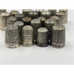 Collection of twenty-two Victorian and later silver thimbles, including five examples by Charles Horner, all hallmarked 