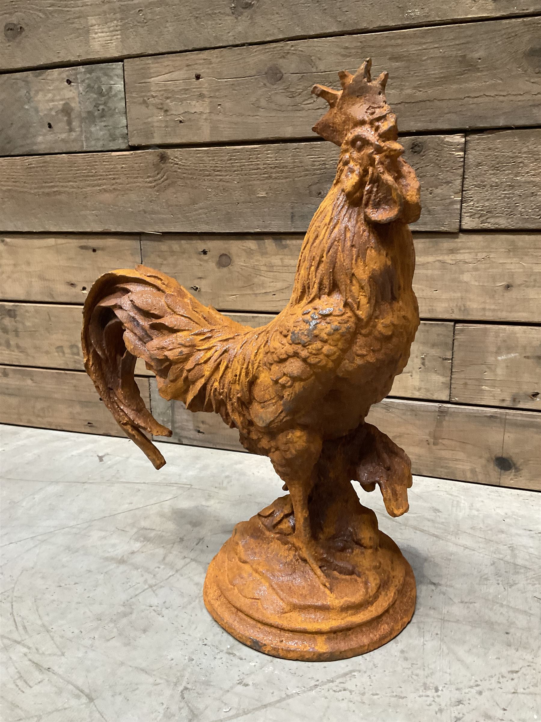 Small weathered cast iron garden cockerel