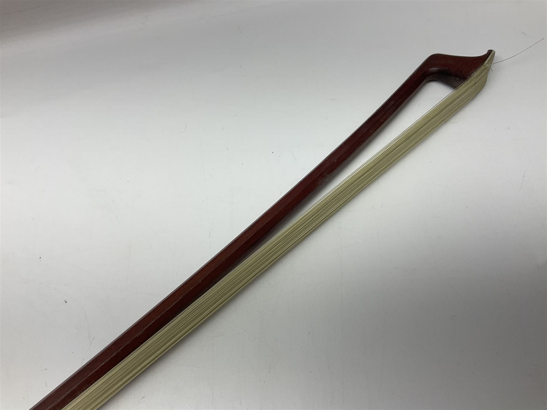 Nickel mounted pernambuco violin bow stamped R. Paesold L73.5cm