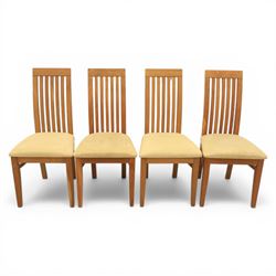 Contemporary teak dining suite comprising extending table and eight chairs, the table with rectangular plank top and one additional leaf extending to 210cm, supported on square tapering legs, the chairs with tall slatted backs and cream upholstered seats