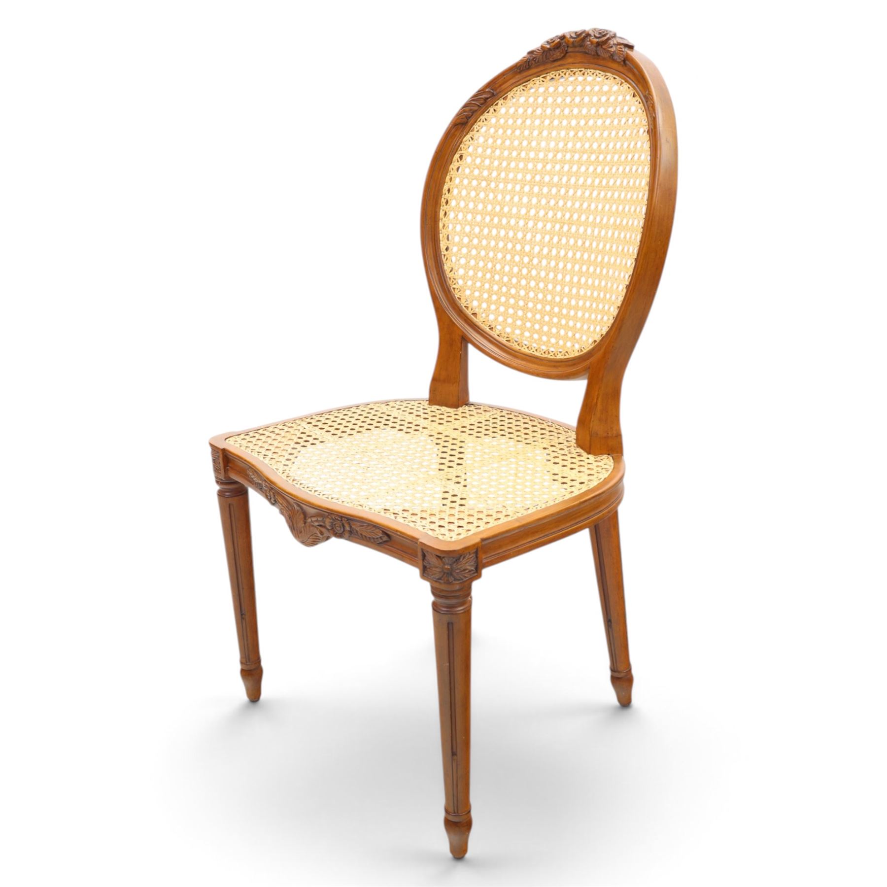 And So To Bed - French design 'Floral Caned Chair', balloon caned back with foliate carving, above a caned serpentine seat, reeded and turned supports