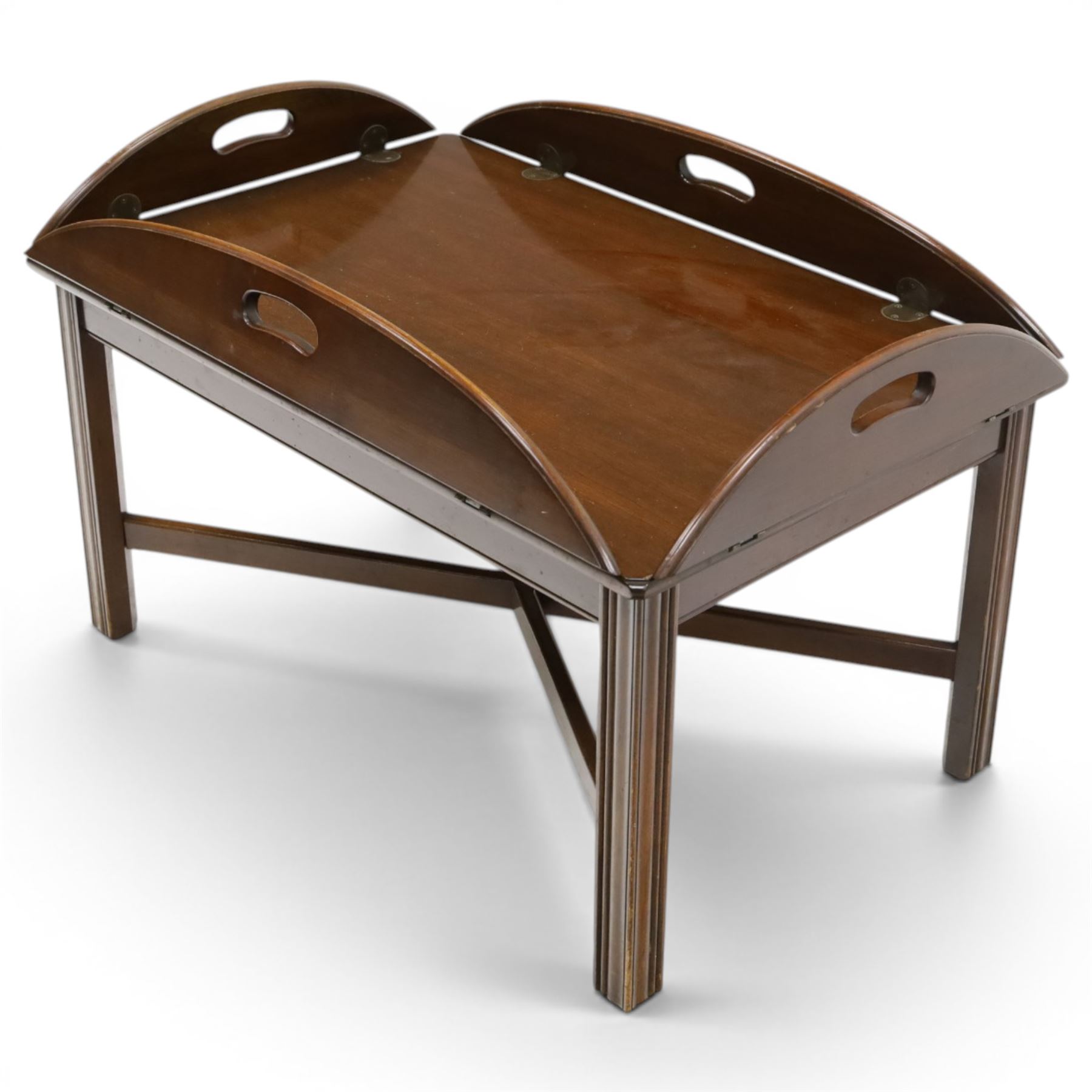 Georgian design mahogany butler's tray coffee table, rectangular tray with hinged shaped sides and pierced carrying handles, on square supports united by X-shaped stretchers