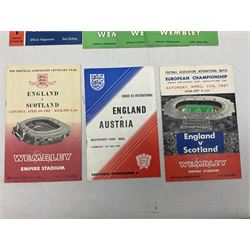 Fourteen football programmes for International matches 1949-66 including England v Ireland Youth International at Boothferry Park Hull May 14th 1949; eight England v Scotland at Wembley, Hampden Park, Newcastle etc; England v Portugal October 25th 1961; England v Austria May 10th 1967 etc (14)