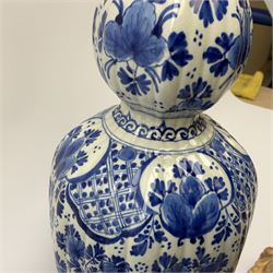 A blue and white Delft vase of double gourd form, with foliate decoration throughout, with painted marks beneath, H38cm, together with a large Spode footed bowl decorated in the Italian pattern, with black printed mark beneath, H13cm, D36.5cm, and three Sylvac terrier dogs.