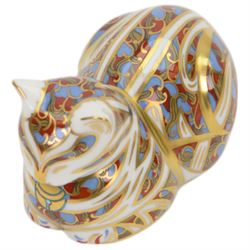 Four Royal Crown Derby paperweights, comprising Large Ram with gold stopper, Penguin with gold stopper, The Spaniel with gold stopper and box and Contented Cat with gold stopper and box   