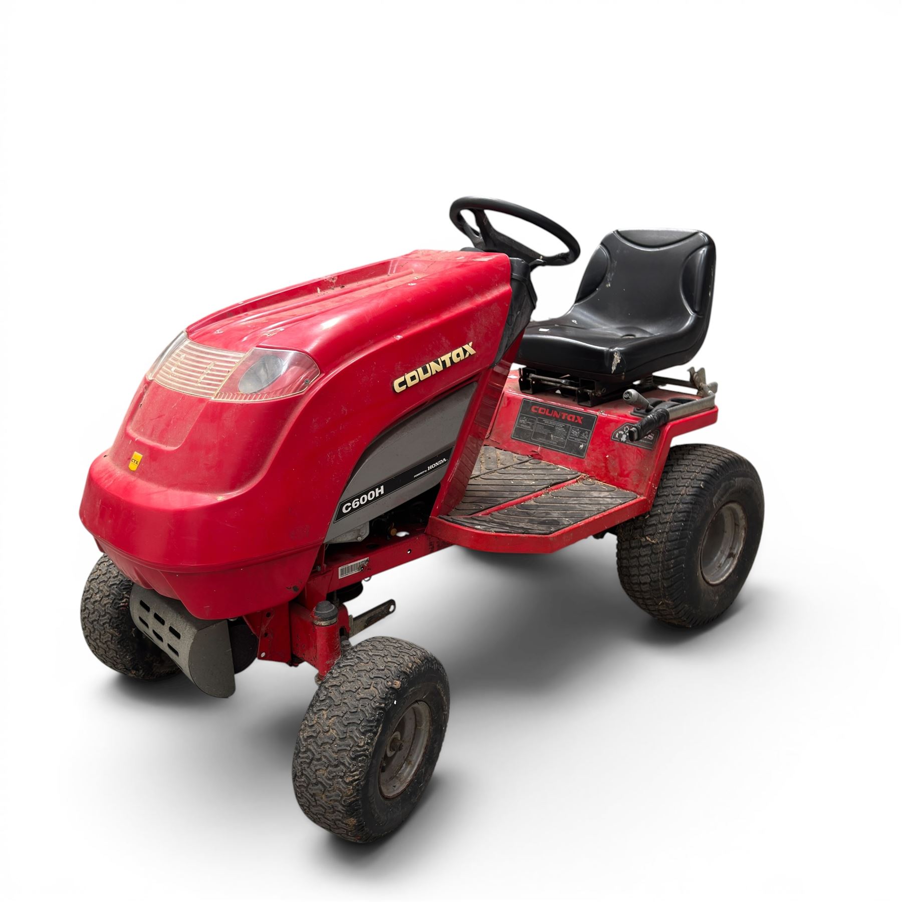 Countax C600H - ride on lawnmower / yard tractor with Honda engine, black seat and red bodywork.